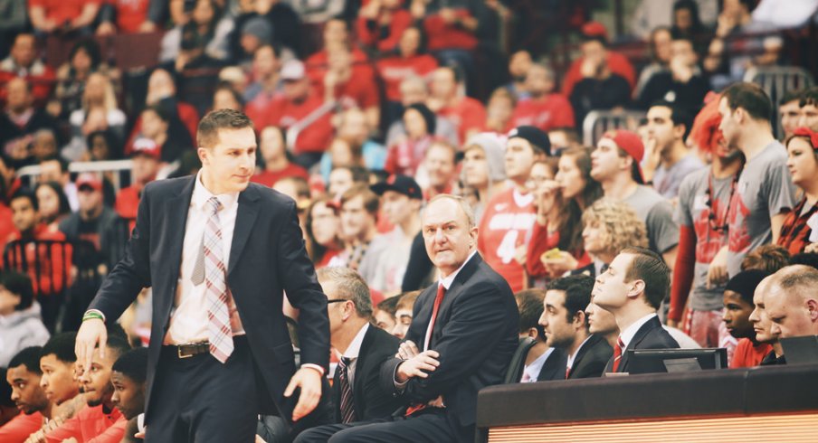 Thad Matta and an assistant coach.