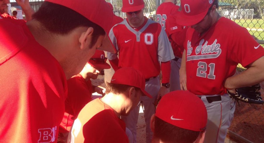 Waiting in the dugout before the Pitt game.