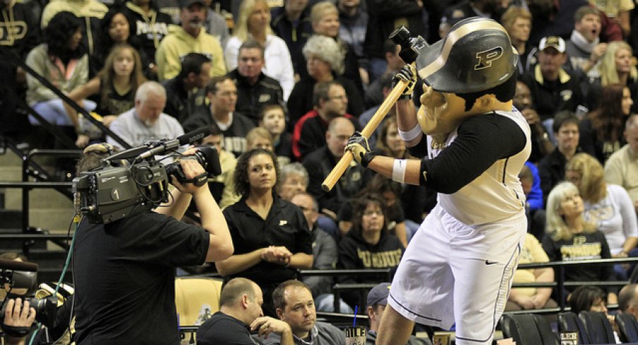 Purdue Pete bangs hammers.