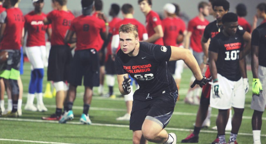 Jake Hausmann runs a route at The Opening regional camp in Columbus.