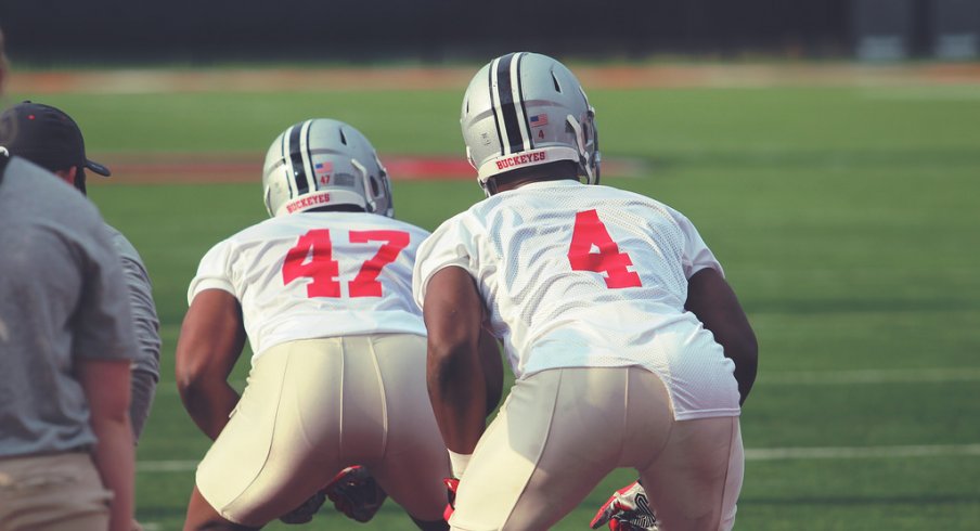 Justin Hilliard (#47) and Jerome Baker (#4) at a fall practice on August 10, 2015