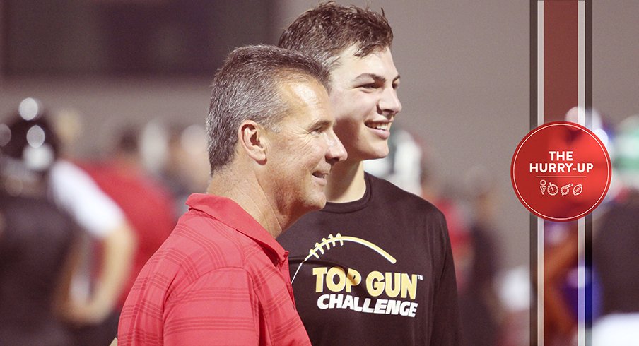 Cole Kmet and Urban Meyer at a camp in June.