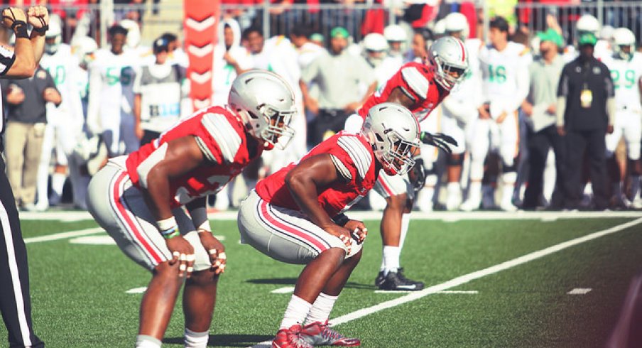 Joshua Perry, Raekwon McMillan, and Darron Lee