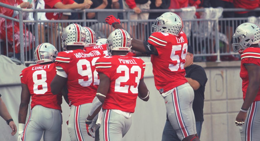 Ohio State celebrates Darron Lee's touchdown.