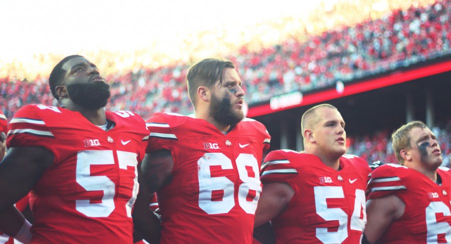 Ohio State signs Carmen Ohio after its game.