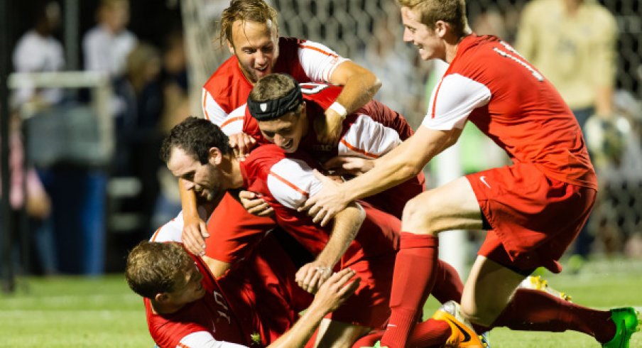 Men's soccer team celebrates a 3-3 draw against No. 11 Akron