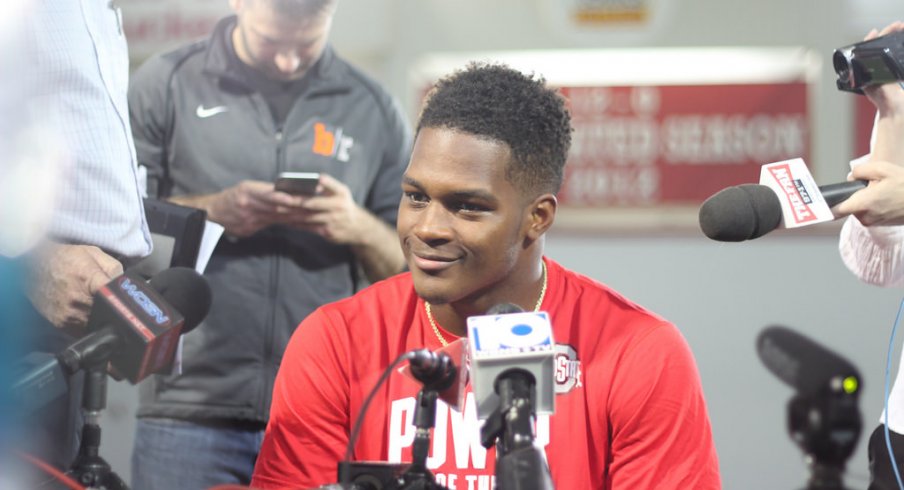 Raekwon McMillan talks to the media.