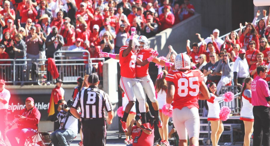 Jalin Marshall, Dontre Wilson celebrate a touchdown.