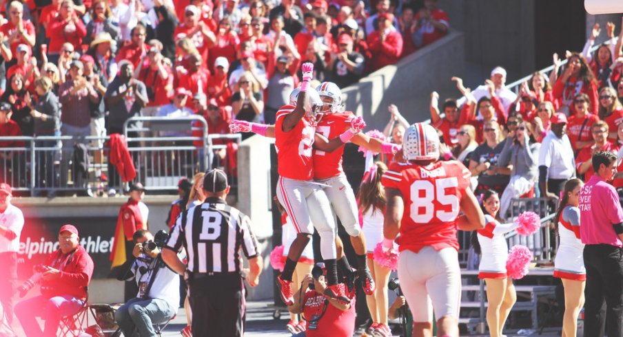 Jalin Marshall and Dontre Wilson celebrate a touchdown