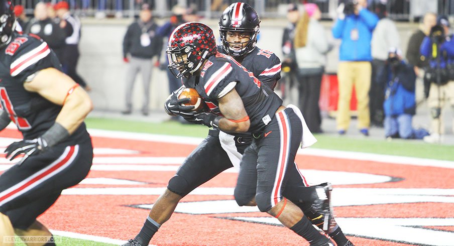 J.T. Barrett and Ezekiel Elliott led the Buckeyes over Penn State, 38-10.