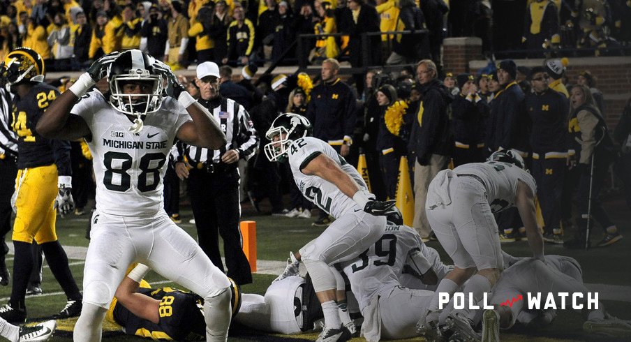 October 17, 2015: Michigan State players celebrate in the end zone after Jalen Watts-Jackson returned a muffed punt 38-yards for the game-winning touchdown while trailing rival Michigan 23-21 with 10-seconds to go in the game. The Spartans won the game 27-21, Saturday at Michigan Stadium. (Photo by Lon Horwedel/Icon Sportswire)