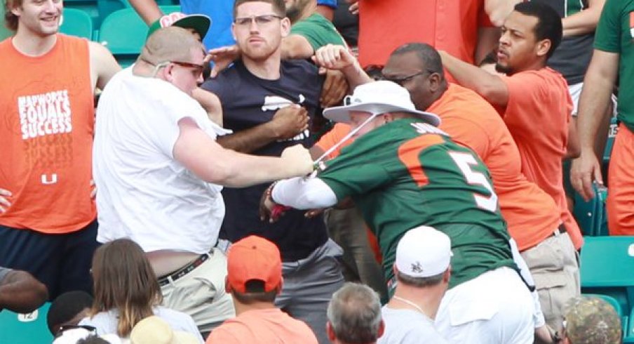 Miami fans fight in the stands