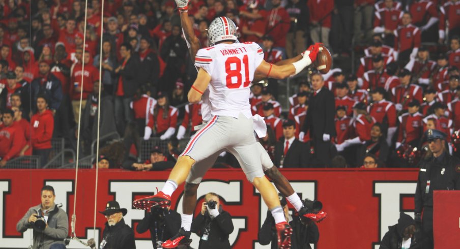 Nick Vannett and Michael Thomas celebrate a touchdown.