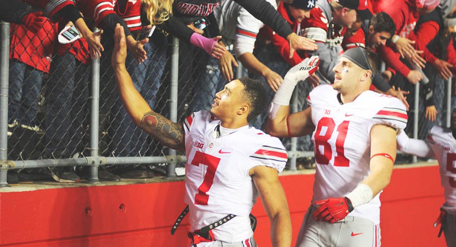 Jalin Marshall and Nick Vannett greet Ohio State fans after the Buckeyes' win over Rutgers.