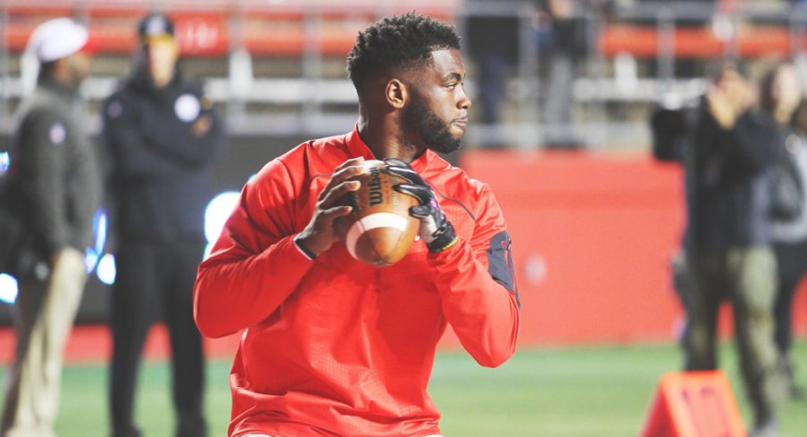 J.T. Barrett warms up vs. Rutgers.