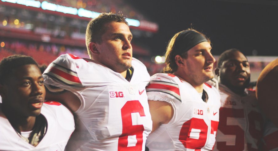 Sam Hubbard, Joey Bosa sing Carmen Ohio.