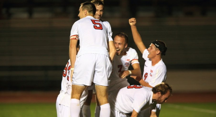 Ohio State men's soccer team celebrates a goal.