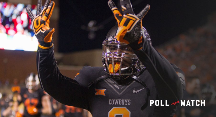 November 7, 2015: Oklahoma State Cowboys linebacker Gyasi Akem (9) celebrates after the Big 12 NCAA football game between the TCU Horned Frogs and the Oklahoma State Cowboys at Boone Pickens Stadium in Stillwater, Oklahoma. Oklahoma State defeated 8th ranked TCU 49-29