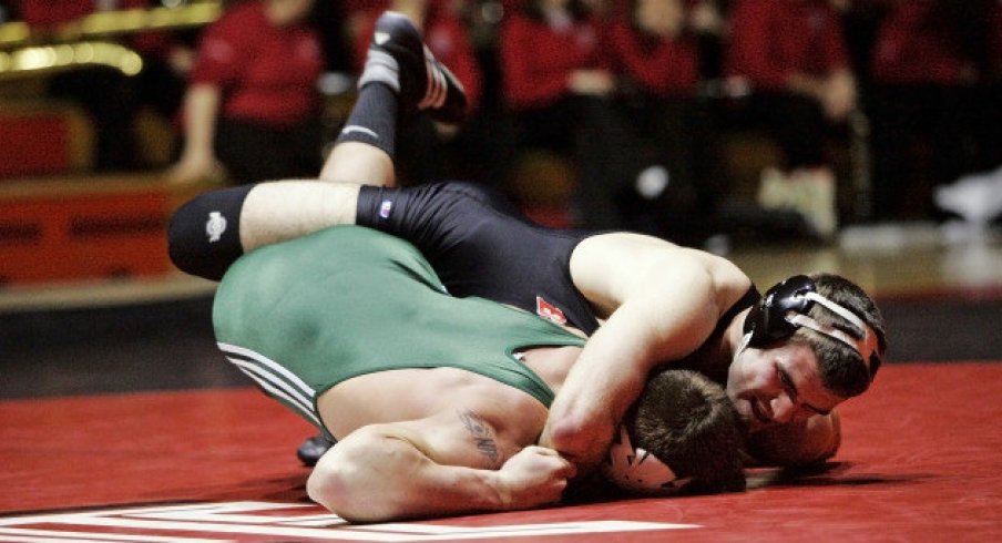 wrestlers taking it to the hoop.