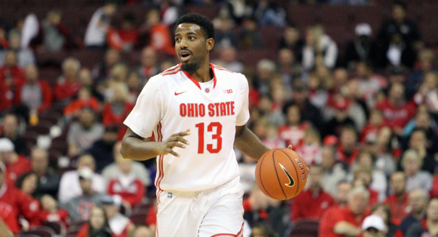 JaQuan Lyle brings the ball up the floor. 