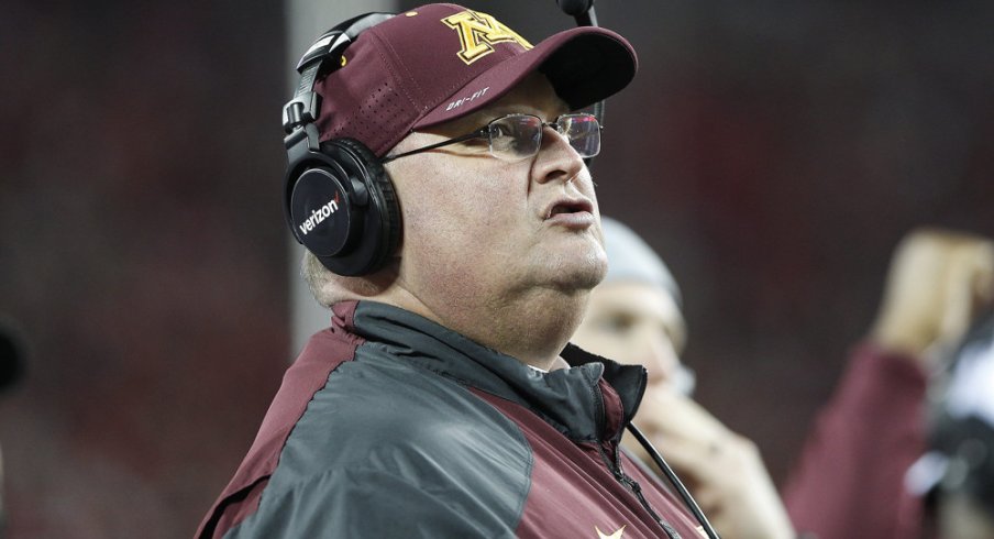 Tracy Claeys is Minnesota's new head football coach, as the school removed his interim tag Wednesday.