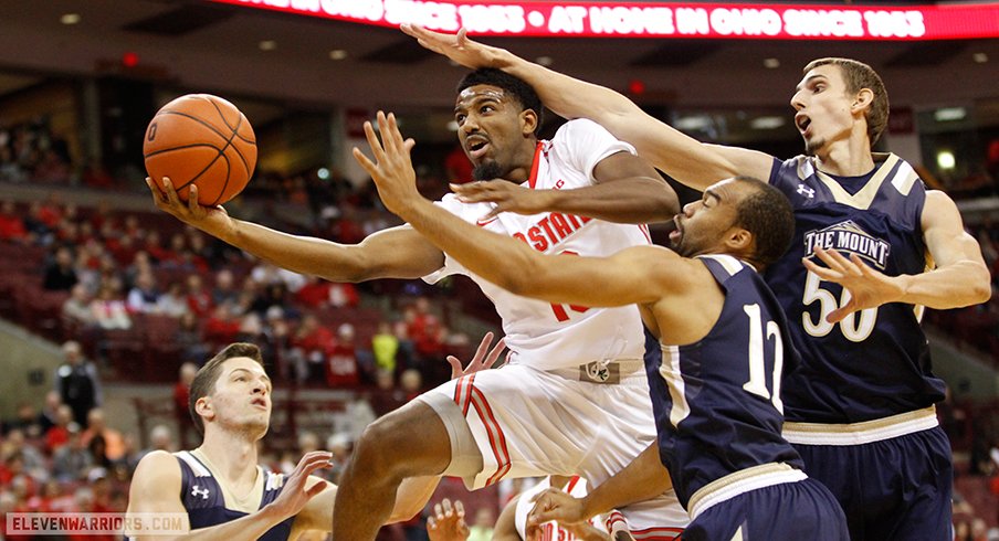 JaQuan Lyle scoops and scores inside.