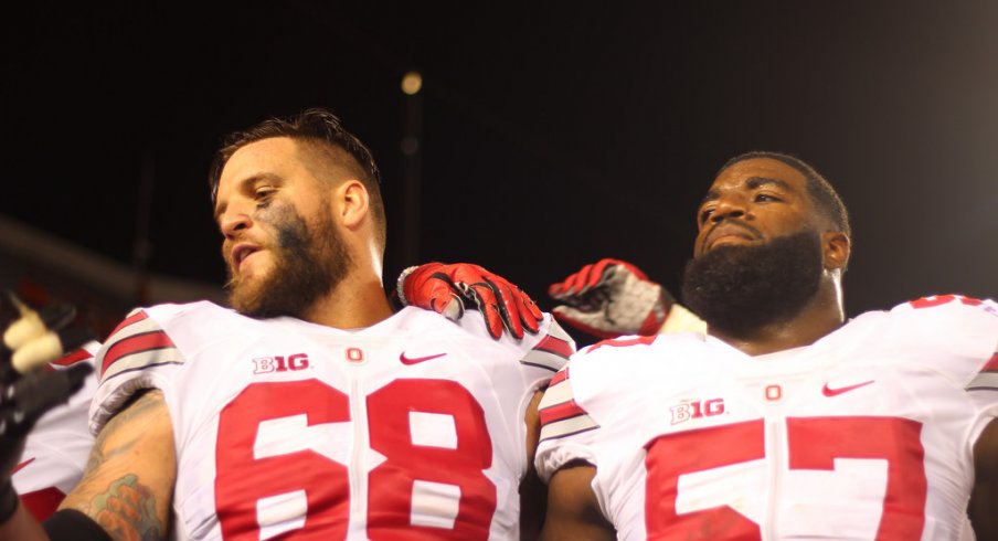 Taylor Decker and Chase Farris sing Carmen Ohio.