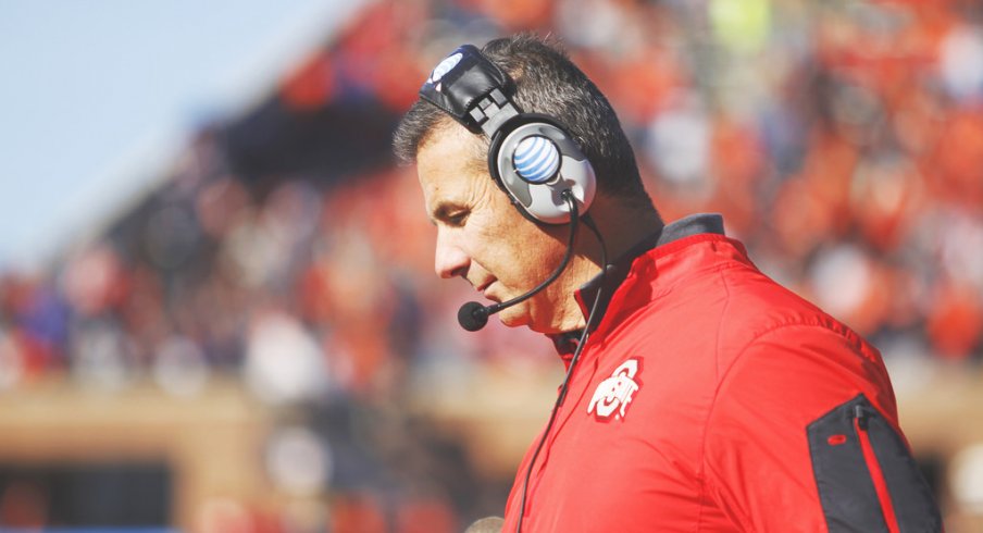 Urban Meyer strolls the sidelines at Illinois. 