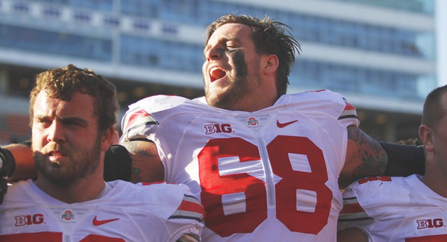 Taylor Decker shows off his pipes during the Carmen Ohio.