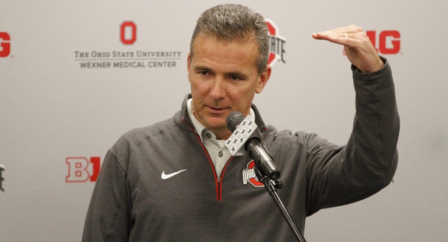 Urban Meyer showing how much he loves fielding calls.