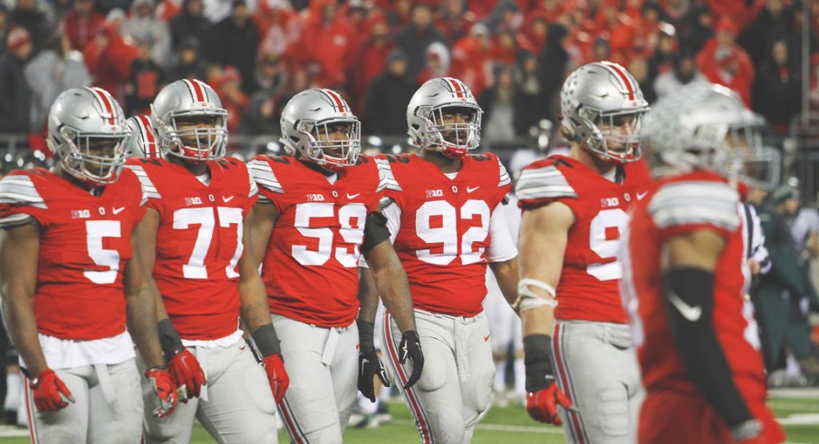 Ohio State's defense walks off the field vs. Michigan State.