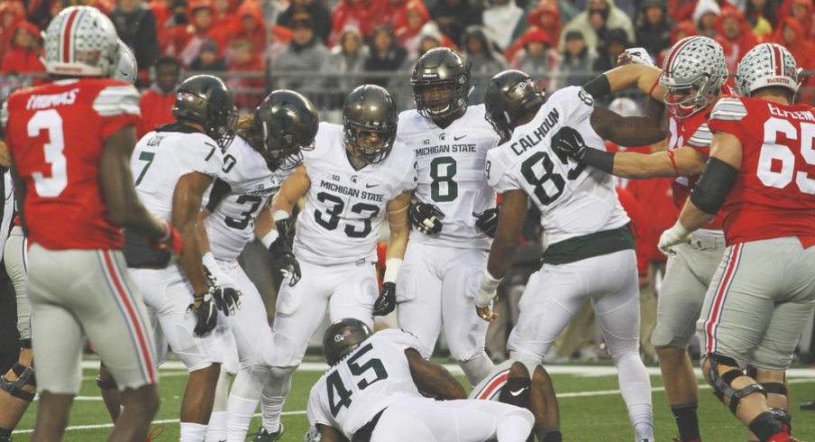 Ohio State's playcalling and offensive line did nothing to throw Michigan State off balance.