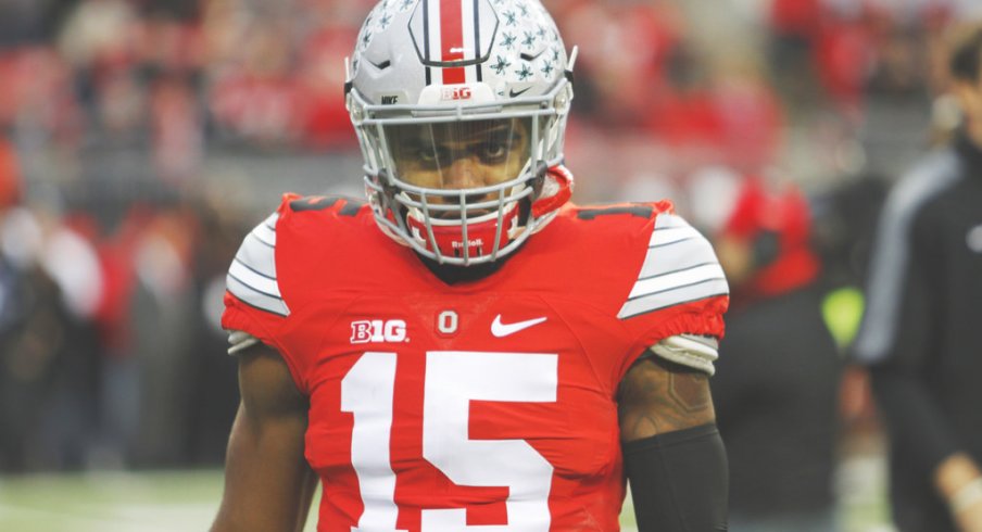 Ezekiel Elliott strolls the sidelines vs. Michigan State.