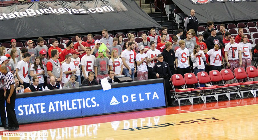 Ohio State students with a cry for help from Penn State