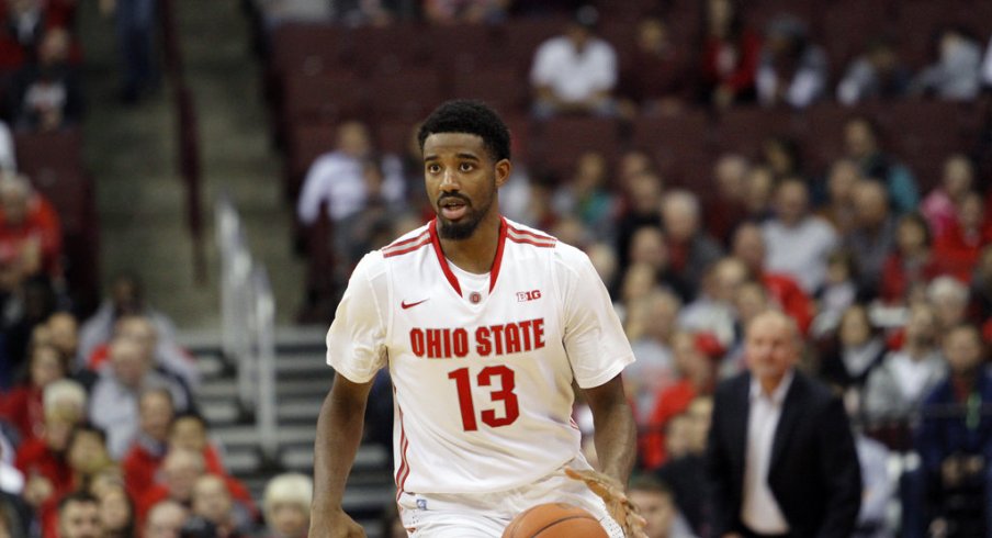 JaQuan Lyle brings the ball up the floor. 