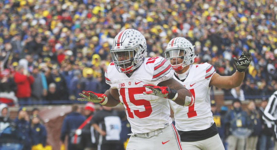 Ezekiel Elliott, Jalin Marshall celebrate a touchdown.