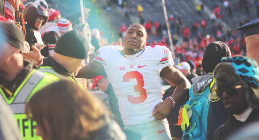 Michael Thomas shakes hands with the fans after Ohio State's 42-13 rout of Michigan. 