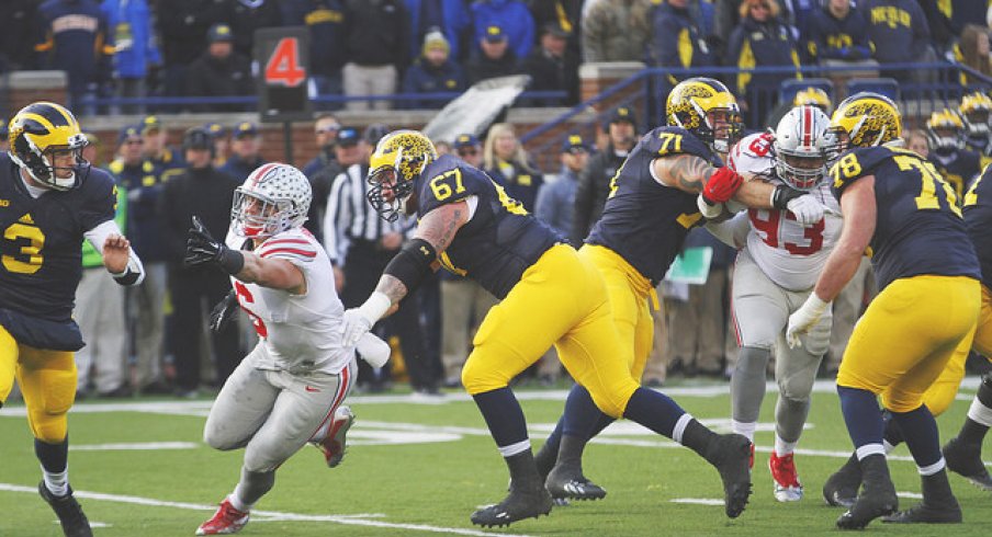 Sam Hubbard hunts down Wilton Speight as Kyle Kalis says "Oh no not again."