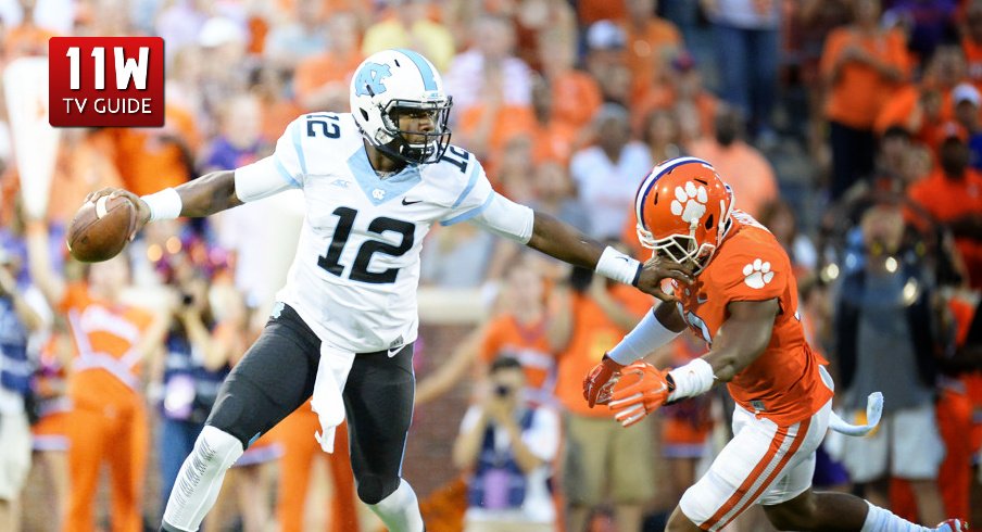 September 27, 2014: North Carolina quarterback Marquise Williams tries to elude a pass rush from Clemson.