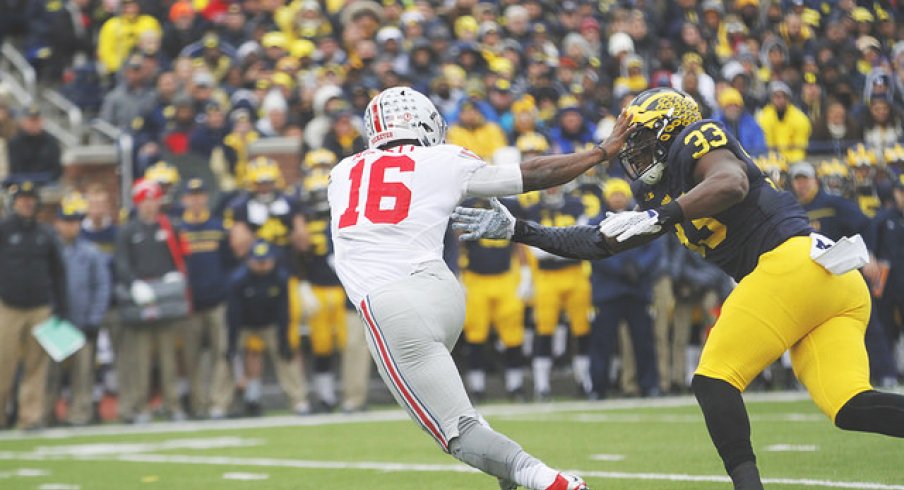 J.T. Barrett rolling out on Michigan.