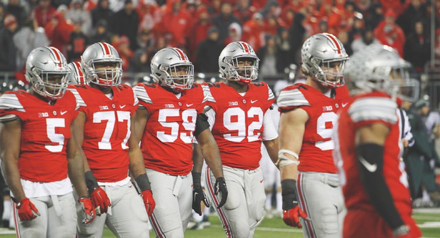 Raekwon McMillan, Michael Hill, Tyquan Lewis, Adolphus Washington, and Joey Bosa prepare for war.