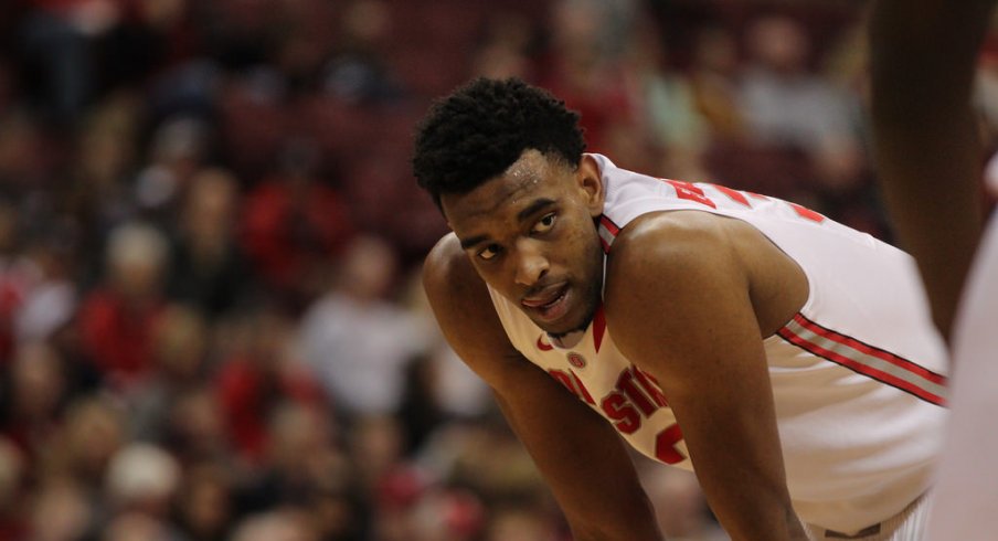 Keita Bates-Diop with his hands on his knees.