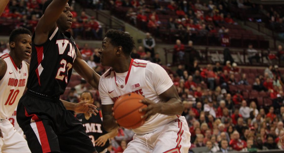 Jae'Sean Tate drives inside against VMI.