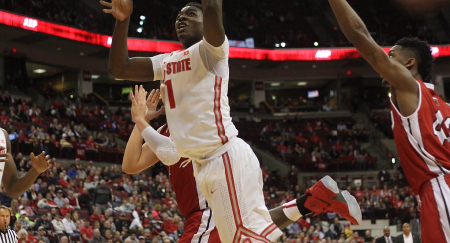 Jae'Sean Tate scores inside against Northern Illinois. 