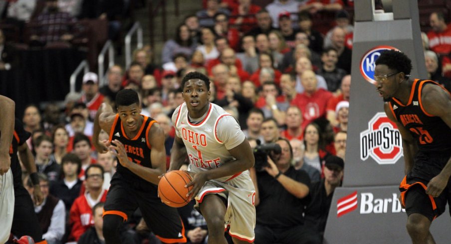 Jae'Sean Tate drives down the floor.