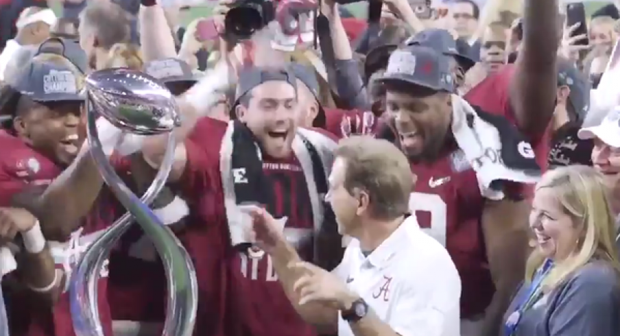 Nick Saban celebrates a championship berth.