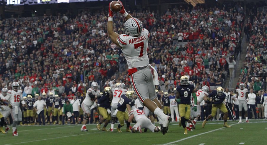 Jalin Marshall makes a snag in the air.