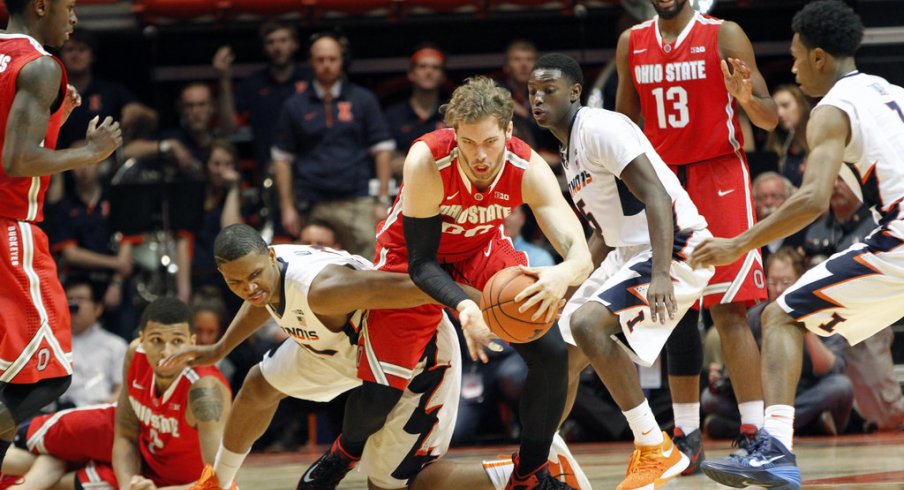 Mickey Mitchell comes up with a loose ball in OT against the Illini.