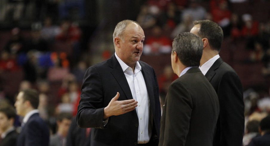 Thad Matta talks to the Northwestern staff.