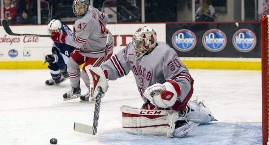 Josh Healey looks on as Christian Frey makes a save for Ohio State against Penn State